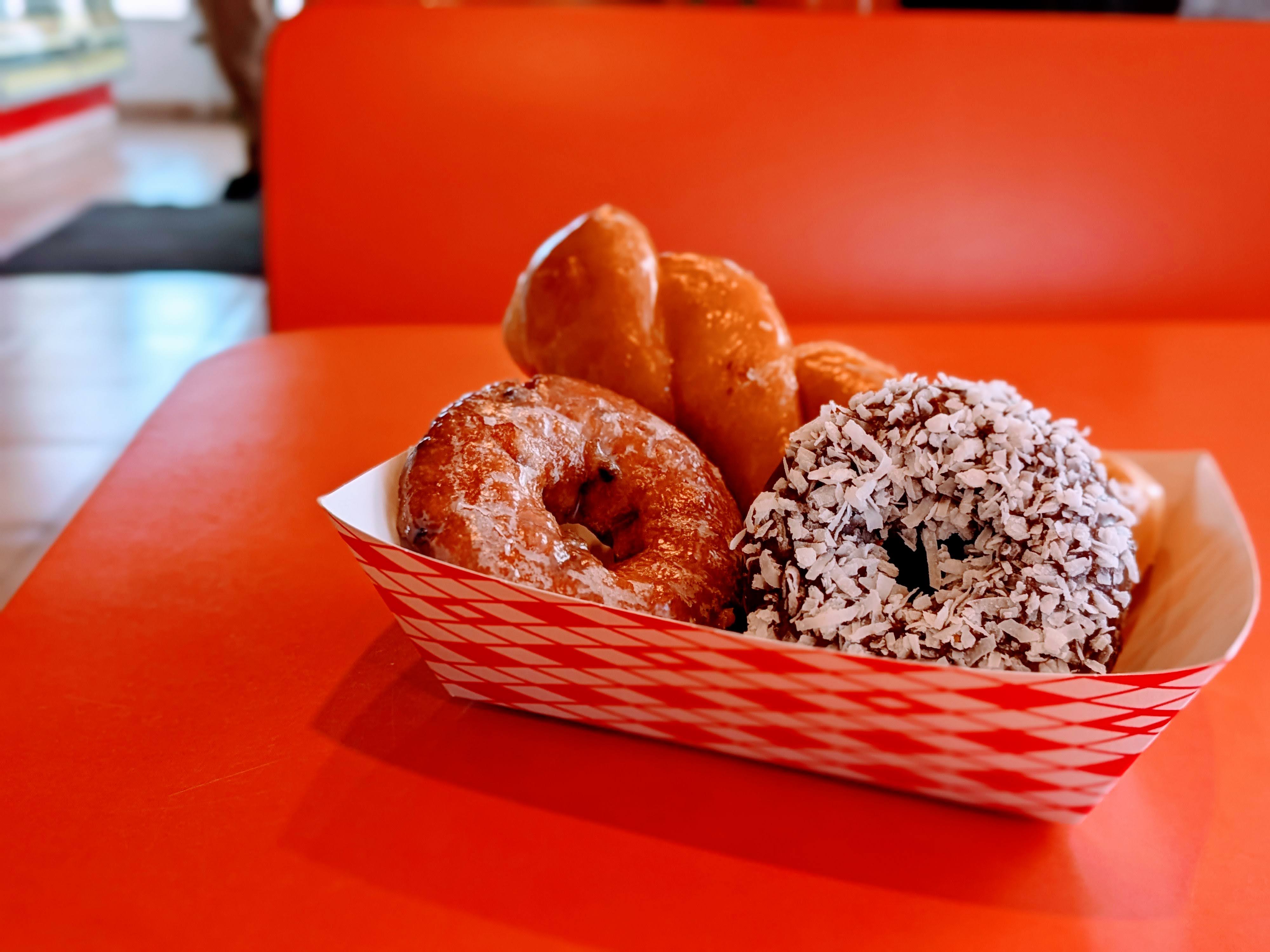 glazed swirl, blueberry donut and coconut chocolat donut
